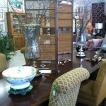 This dining room table has 2 leaves and a great price of 395.00. The chairs are priced at 119.00 a piece .